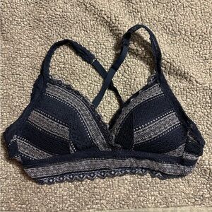 Navy and light blue bralette with lace details and cross back adjustable straps
